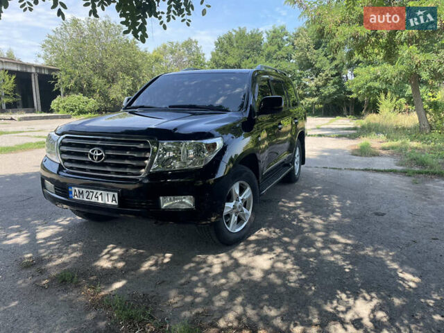 Черный Тойота Ленд Крузер, объемом двигателя 4.46 л и пробегом 305 тыс. км за 30500 $, фото 1 на Automoto.ua