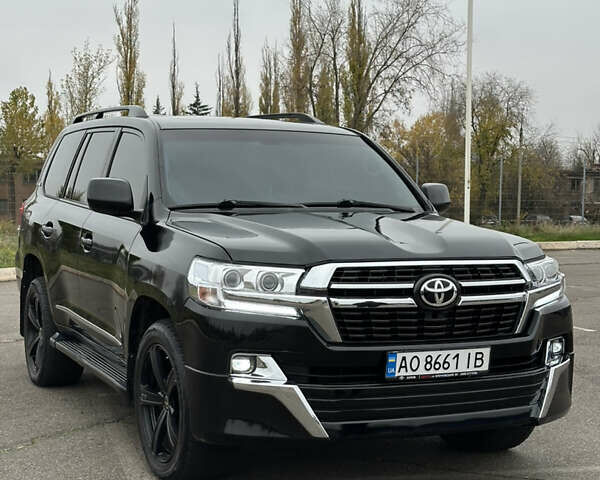 Черный Тойота Ленд Крузер, объемом двигателя 4.46 л и пробегом 300 тыс. км за 31999 $, фото 1 на Automoto.ua