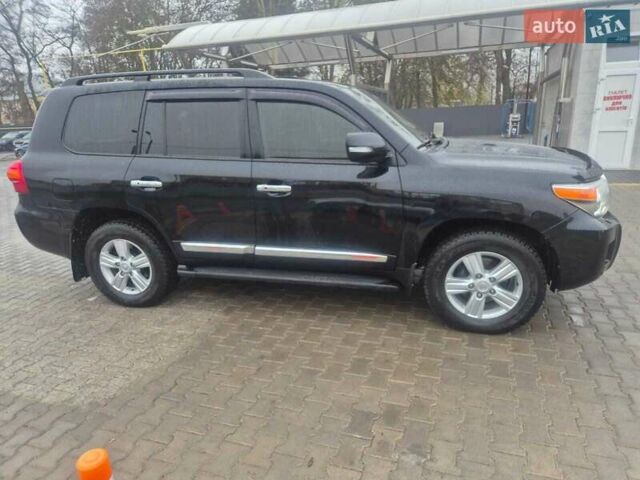 Чорний Тойота Ленд Крузер, об'ємом двигуна 4.46 л та пробігом 300 тис. км за 33000 $, фото 1 на Automoto.ua