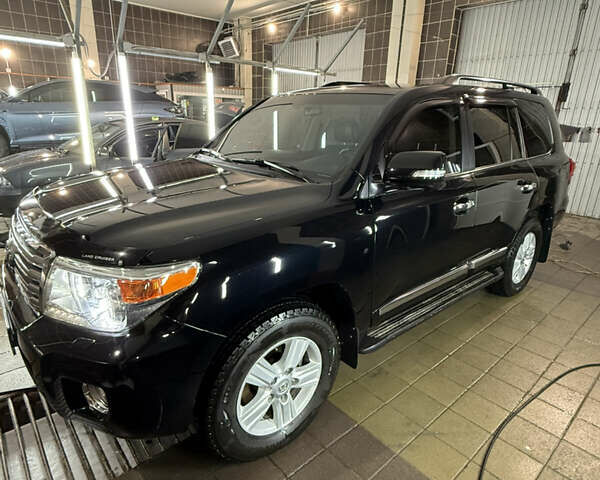 Черный Тойота Ленд Крузер, объемом двигателя 4.46 л и пробегом 140 тыс. км за 41000 $, фото 1 на Automoto.ua