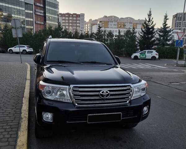 Черный Тойота Ленд Крузер, объемом двигателя 4.5 л и пробегом 275 тыс. км за 35600 $, фото 1 на Automoto.ua