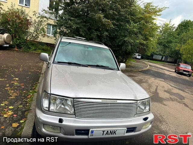 Серый Тойота Ленд Крузер, объемом двигателя 4.7 л и пробегом 419 тыс. км за 10000 $, фото 1 на Automoto.ua