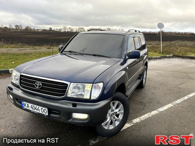 Синій Тойота Ленд Крузер, об'ємом двигуна 4.7 л та пробігом 536 тис. км за 10100 $, фото 1 на Automoto.ua