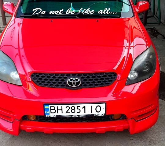 Красный Тойота Матрикс, объемом двигателя 1.8 л и пробегом 285 тыс. км за 4600 $, фото 1 на Automoto.ua