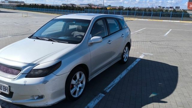 Серый Тойота Матрикс, объемом двигателя 1.8 л и пробегом 250 тыс. км за 3700 $, фото 1 на Automoto.ua