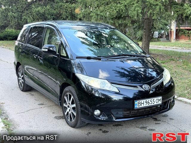 Черный Тойота Превиа, объемом двигателя 2.4 л и пробегом 128 тыс. км за 10900 $, фото 1 на Automoto.ua