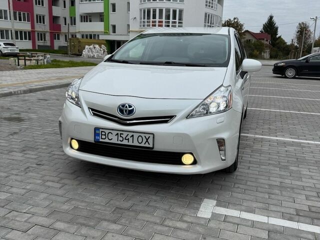 Белый Тойота Приус, объемом двигателя 1.8 л и пробегом 235 тыс. км за 13100 $, фото 1 на Automoto.ua