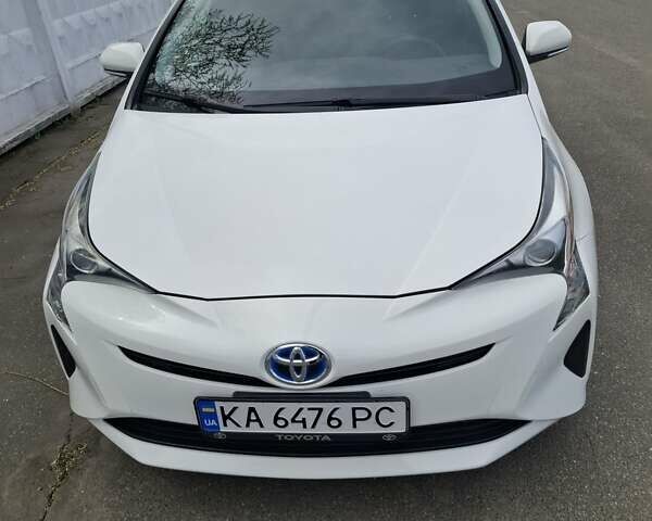 Белый Тойота Приус, объемом двигателя 1.8 л и пробегом 59 тыс. км за 16850 $, фото 1 на Automoto.ua