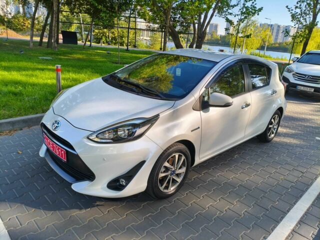 Білий Тойота Пріус, об'ємом двигуна 1.5 л та пробігом 73 тис. км за 12800 $, фото 1 на Automoto.ua
