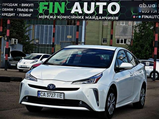 Белый Тойота Приус, объемом двигателя 1.8 л и пробегом 71 тыс. км за 22600 $, фото 1 на Automoto.ua