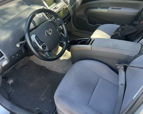 Белый Тойота Приус, объемом двигателя 1.6 л и пробегом 180 тыс. км за 5700 $, фото 1 на Automoto.ua