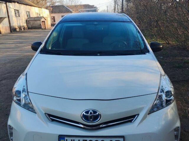 Белый Тойота Приус, объемом двигателя 1.8 л и пробегом 230 тыс. км за 9300 $, фото 1 на Automoto.ua
