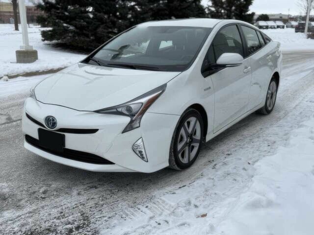 Білий Тойота Пріус, об'ємом двигуна 1.8 л та пробігом 75 тис. км за 8000 $, фото 1 на Automoto.ua