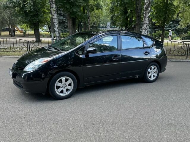 Черный Тойота Приус, объемом двигателя 1.5 л и пробегом 235 тыс. км за 6000 $, фото 1 на Automoto.ua