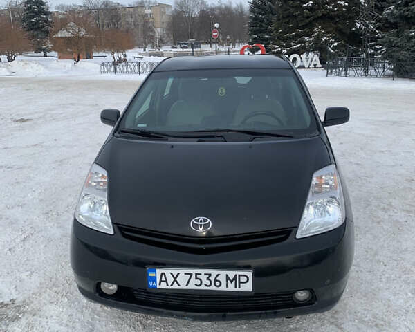 Черный Тойота Приус, объемом двигателя 1.5 л и пробегом 232 тыс. км за 7000 $, фото 1 на Automoto.ua