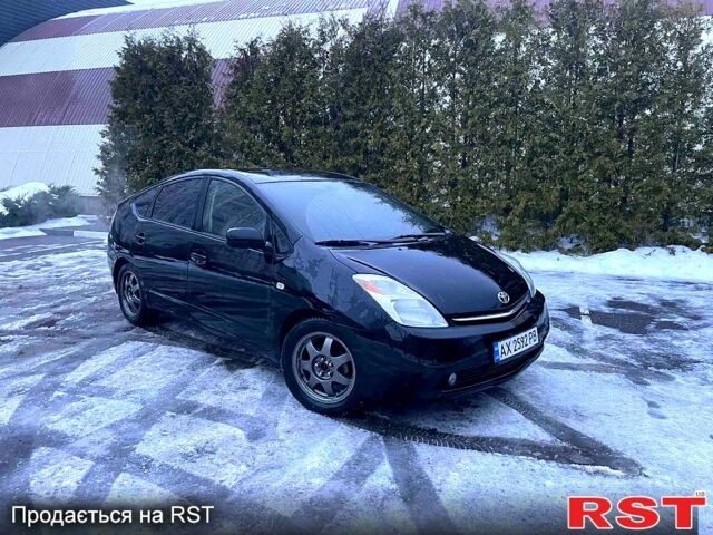 Черный Тойота Приус, объемом двигателя 1.5 л и пробегом 255 тыс. км за 7500 $, фото 1 на Automoto.ua