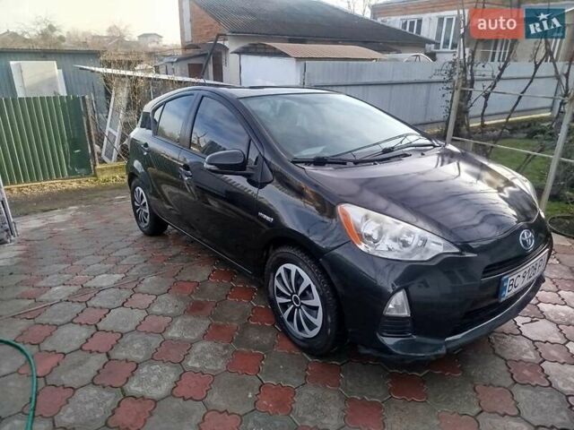 Черный Тойота Приус, объемом двигателя 1.5 л и пробегом 251 тыс. км за 7200 $, фото 1 на Automoto.ua