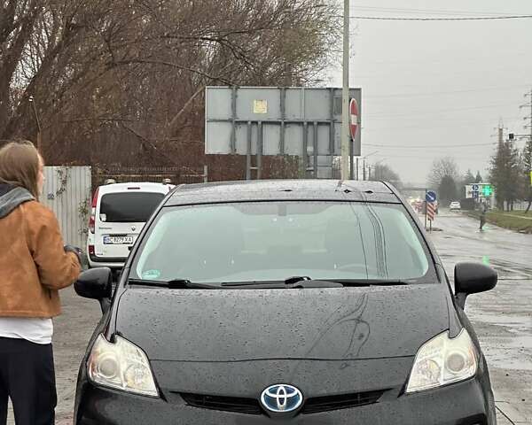 Черный Тойота Приус, объемом двигателя 1.8 л и пробегом 101 тыс. км за 10800 $, фото 1 на Automoto.ua