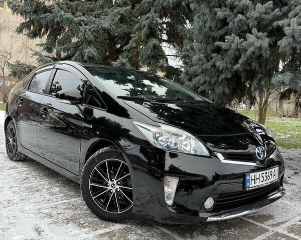 Черный Тойота Приус, объемом двигателя 1.8 л и пробегом 123 тыс. км за 12400 $, фото 1 на Automoto.ua
