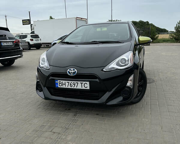 Чорний Тойота Пріус, об'ємом двигуна 1.5 л та пробігом 98 тис. км за 12500 $, фото 1 на Automoto.ua
