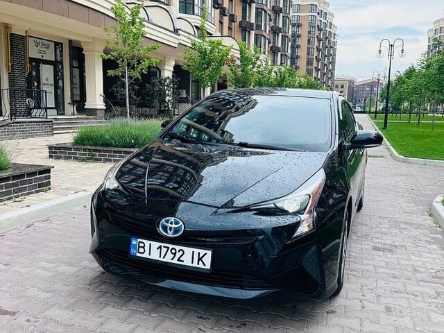 Черный Тойота Приус, объемом двигателя 1.8 л и пробегом 219 тыс. км за 16500 $, фото 1 на Automoto.ua