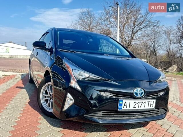 Черный Тойота Приус, объемом двигателя 1.79 л и пробегом 143 тыс. км за 15500 $, фото 1 на Automoto.ua