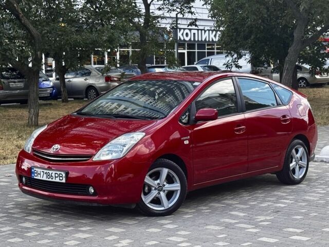Красный Тойота Приус, объемом двигателя 1.5 л и пробегом 250 тыс. км за 6650 $, фото 1 на Automoto.ua