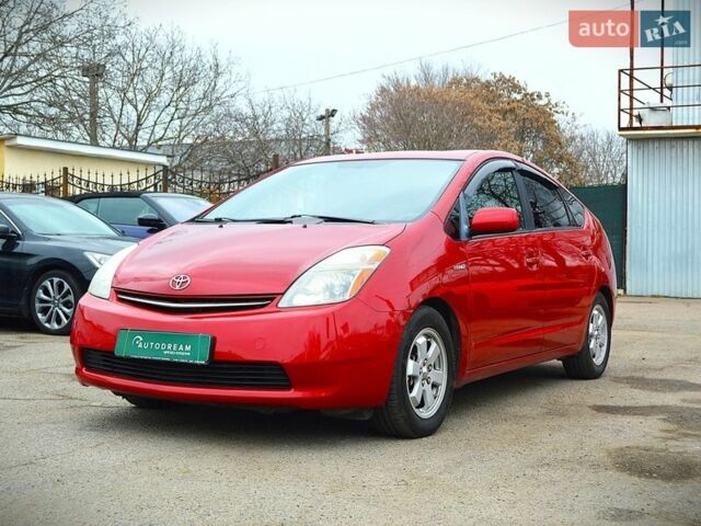 Красный Тойота Приус, объемом двигателя 1.5 л и пробегом 141 тыс. км за 9600 $, фото 1 на Automoto.ua