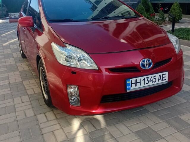Красный Тойота Приус, объемом двигателя 1.8 л и пробегом 380 тыс. км за 7000 $, фото 1 на Automoto.ua