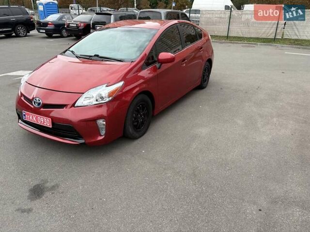 Красный Тойота Приус, объемом двигателя 1.8 л и пробегом 167 тыс. км за 12500 $, фото 1 на Automoto.ua