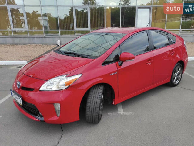 Красный Тойота Приус, объемом двигателя 1.8 л и пробегом 128 тыс. км за 12600 $, фото 1 на Automoto.ua