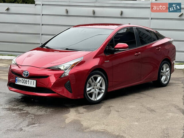 Красный Тойота Приус, объемом двигателя 1.8 л и пробегом 73 тыс. км за 16900 $, фото 1 на Automoto.ua