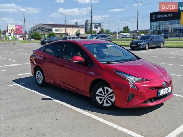 Красный Тойота Приус, объемом двигателя 1.8 л и пробегом 169 тыс. км за 15900 $, фото 1 на Automoto.ua