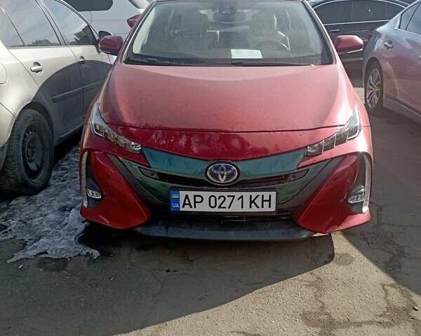 Красный Тойота Приус, объемом двигателя 1.8 л и пробегом 170 тыс. км за 20500 $, фото 1 на Automoto.ua