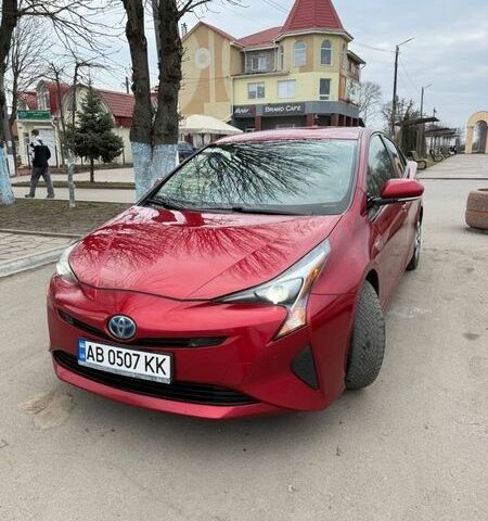 Красный Тойота Приус, объемом двигателя 1.8 л и пробегом 165 тыс. км за 15500 $, фото 1 на Automoto.ua