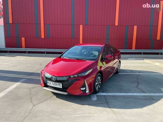 Красный Тойота Приус, объемом двигателя 1.8 л и пробегом 136 тыс. км за 17800 $, фото 1 на Automoto.ua