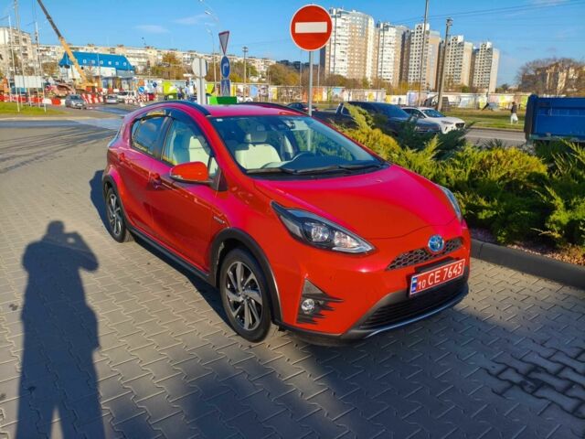Красный Тойота Приус, объемом двигателя 1.5 л и пробегом 66 тыс. км за 14800 $, фото 1 на Automoto.ua