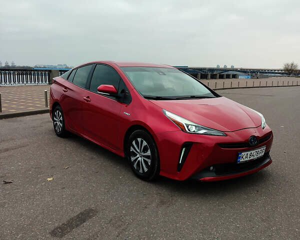 Красный Тойота Приус, объемом двигателя 1.8 л и пробегом 147 тыс. км за 19200 $, фото 1 на Automoto.ua