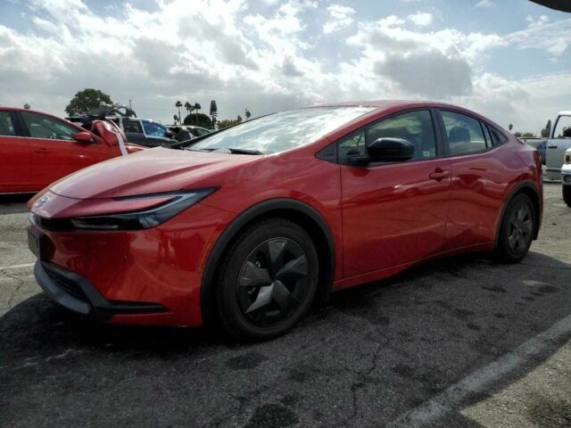 Красный Тойота Приус, объемом двигателя 2 л и пробегом 9 тыс. км за 7900 $, фото 1 на Automoto.ua