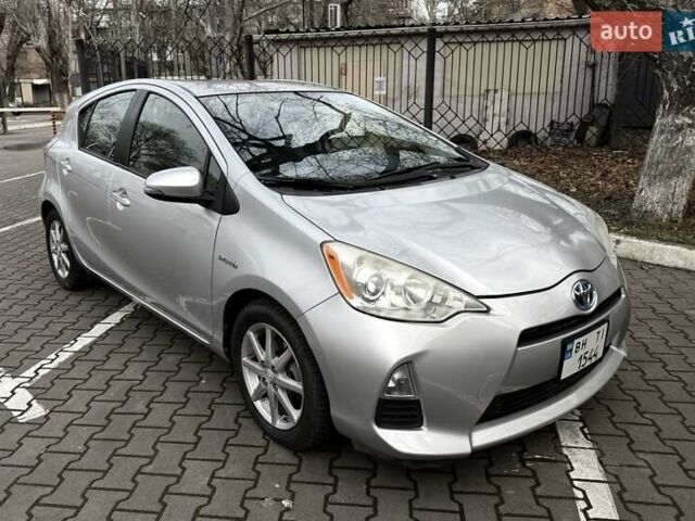 Серый Тойота Приус, объемом двигателя 1.5 л и пробегом 165 тыс. км за 10000 $, фото 1 на Automoto.ua