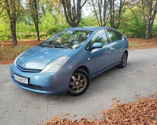 Синій Тойота Пріус, об'ємом двигуна 1.5 л та пробігом 299 тис. км за 7000 $, фото 1 на Automoto.ua