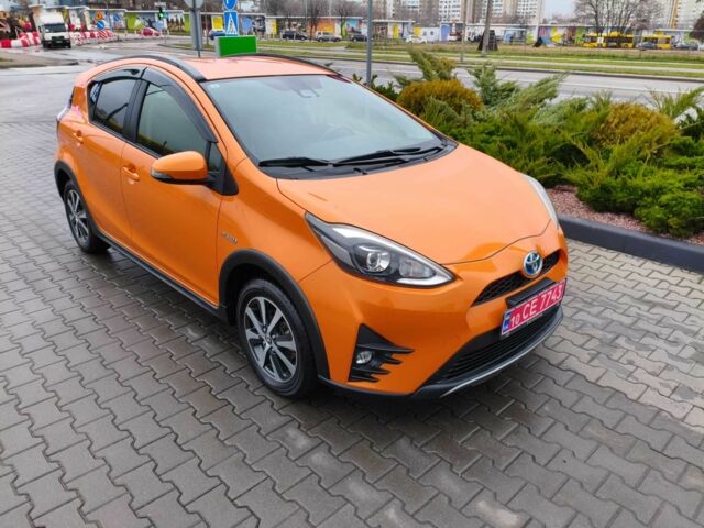 Оранжевый Тойота Приус, объемом двигателя 1.5 л и пробегом 97 тыс. км за 13400 $, фото 1 на Automoto.ua