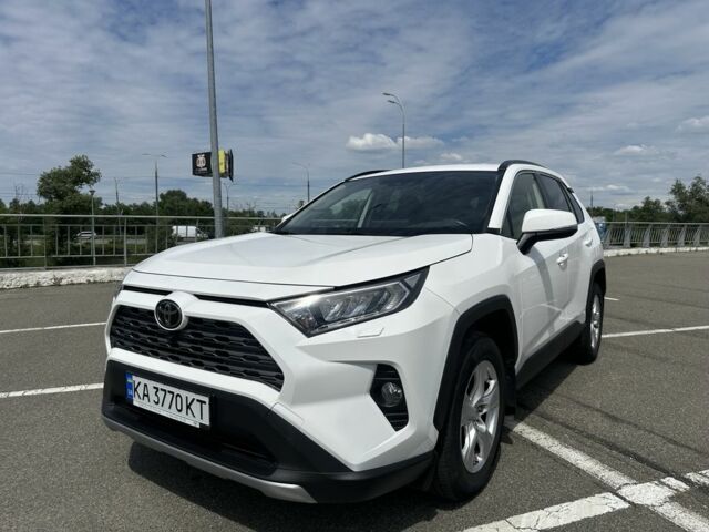 Білий Тойота РАВ 4, об'ємом двигуна 2 л та пробігом 85 тис. км за 27503 $, фото 1 на Automoto.ua