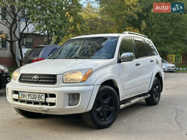 Белый Тойота РАВ 4, объемом двигателя 2 л и пробегом 147 тыс. км за 5350 $, фото 1 на Automoto.ua