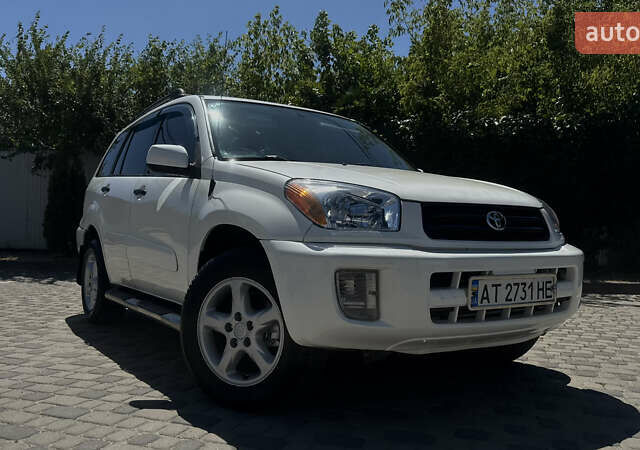 Белый Тойота РАВ 4, объемом двигателя 2 л и пробегом 169 тыс. км за 7450 $, фото 1 на Automoto.ua