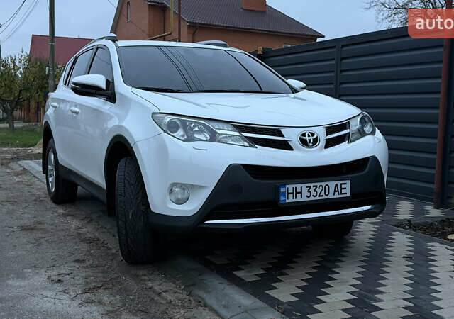Белый Тойота РАВ 4, объемом двигателя 2.49 л и пробегом 252 тыс. км за 15500 $, фото 1 на Automoto.ua