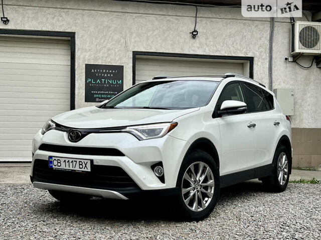 Белый Тойота РАВ 4, объемом двигателя 2.49 л и пробегом 130 тыс. км за 18000 $, фото 1 на Automoto.ua