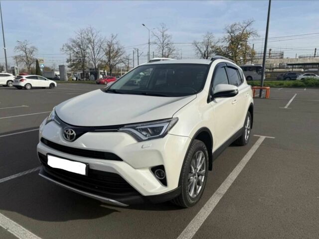 Белый Тойота РАВ 4, объемом двигателя 2.5 л и пробегом 159 тыс. км за 18000 $, фото 1 на Automoto.ua