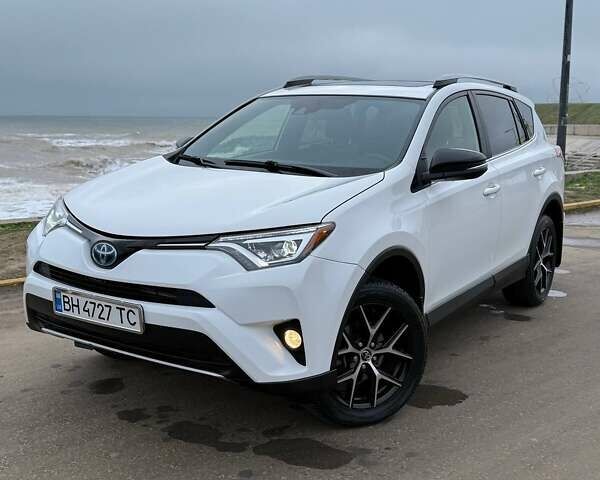 Білий Тойота РАВ 4, об'ємом двигуна 2.49 л та пробігом 90 тис. км за 25000 $, фото 1 на Automoto.ua