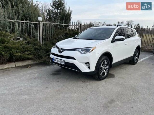 Белый Тойота РАВ 4, объемом двигателя 2.49 л и пробегом 106 тыс. км за 18500 $, фото 1 на Automoto.ua